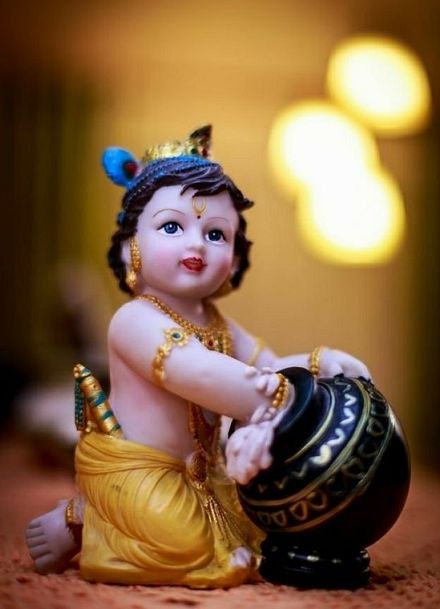 Pictures of Lord Krishna Eating Makhan